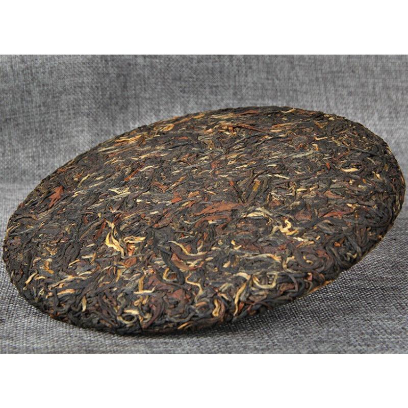 Gu Shu Hong Cha Sonnengetrockneter alter Baum Dianhong Dian Hong Schwarzteekuchen 357g