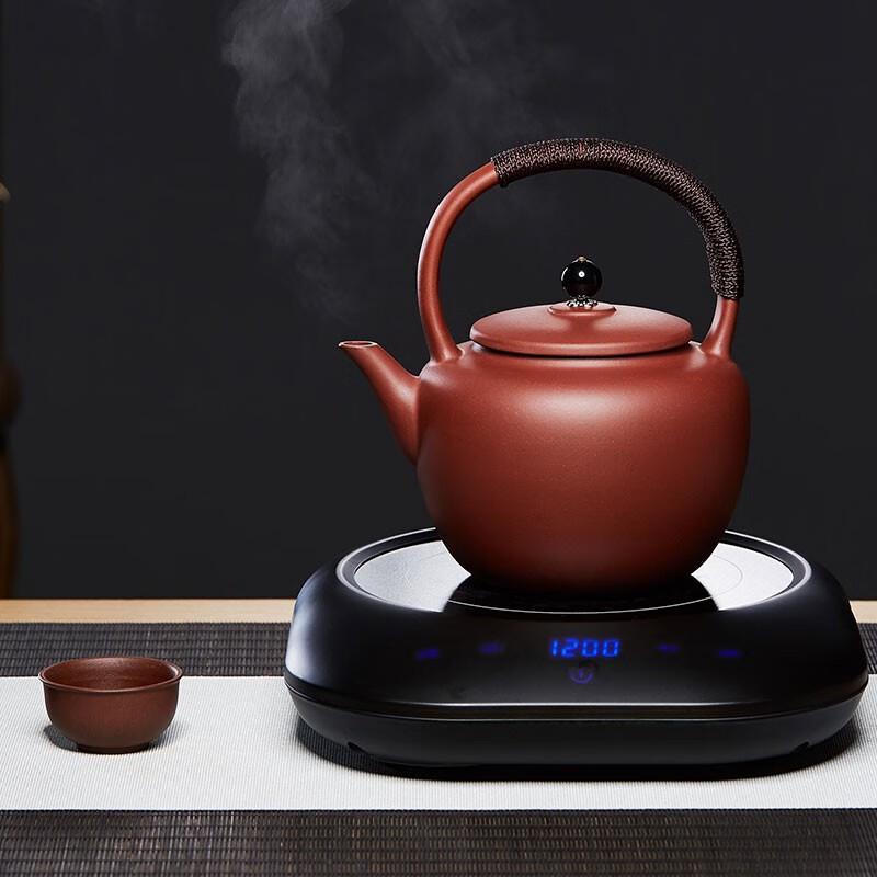 

Чайный набор: Чайник из фиолетовой глины и электрическая керамическая плитка