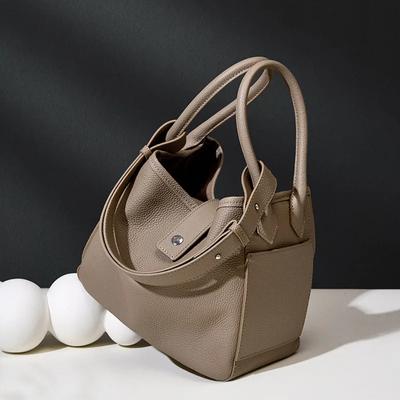 Bolsos de mano de cuero genuino para damas, con diseño de nicho de piel de vaca, estilo bandolera de cuero suave y temperamento.