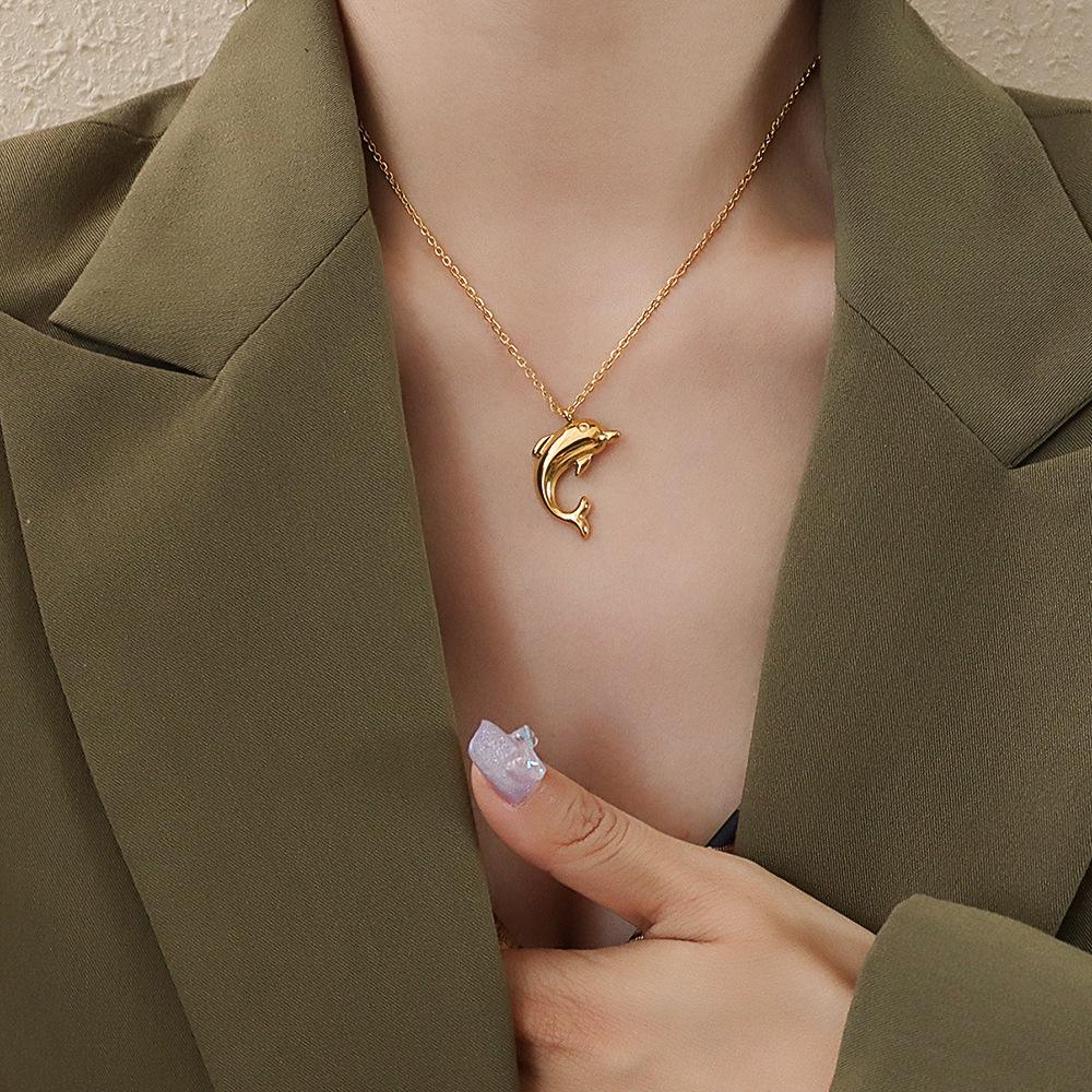 Elegant Dolphin Pendant Necklace: 18K Gold-Plated Titanium Steel Clavicle Chain for Women.