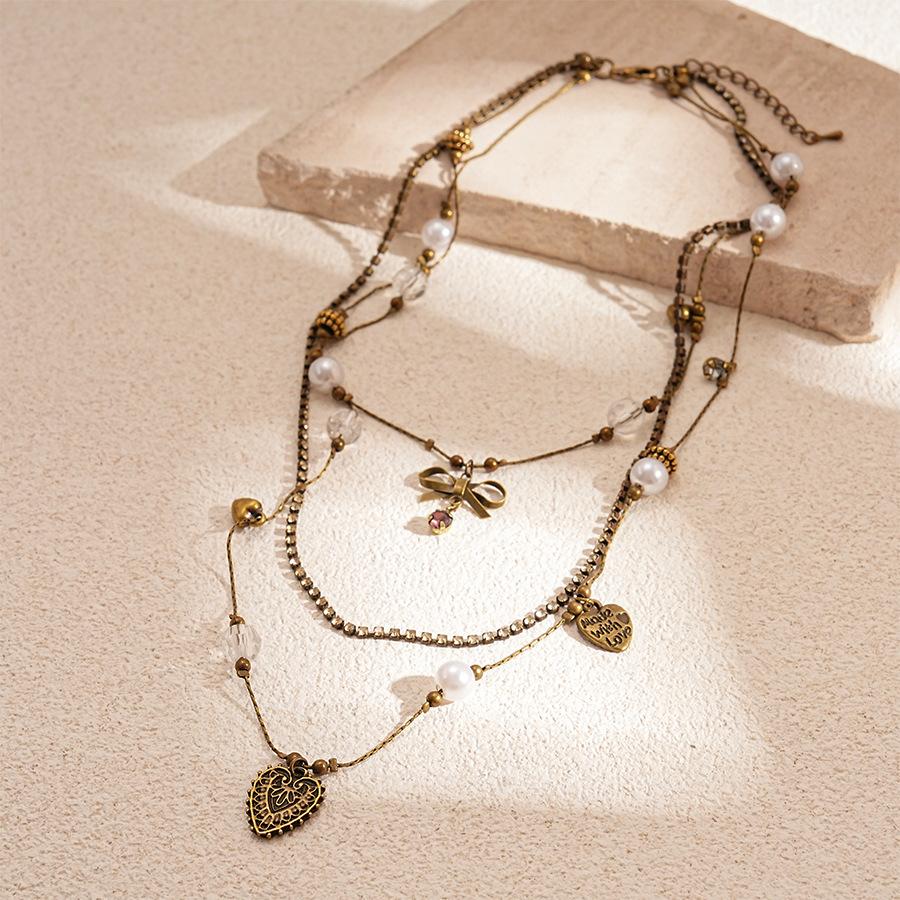 Diamond imitation pearl bow love multi-layer collarbone necklace temperament necklace
