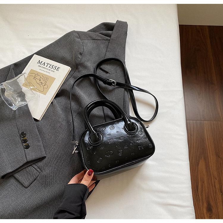 

Кожа с масляной восковой пропиткой, ретро, портативная маленькая сумка, женская, 2025, новая модная текстурная сумка-боулинг, повседневная на плечо, сумка-мессенджер