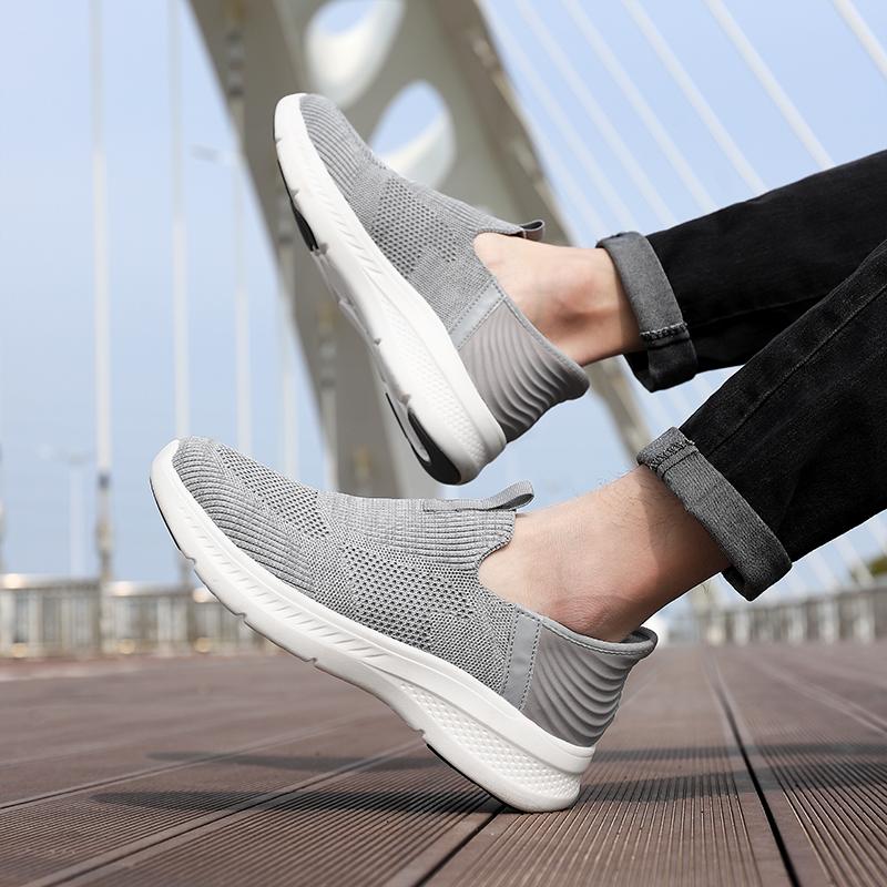 Herrenschuhe ein neuer Slipper Netzschuhe Fliegenstrick Sportschuhe Laufschuhe lässige weiche Sohlen mit allen Modeschuhen
