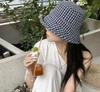 Spring and summer new plaid bow sunshade fisherman hat children outdoor big eaves show small face versatile sunscreen hat basin hat