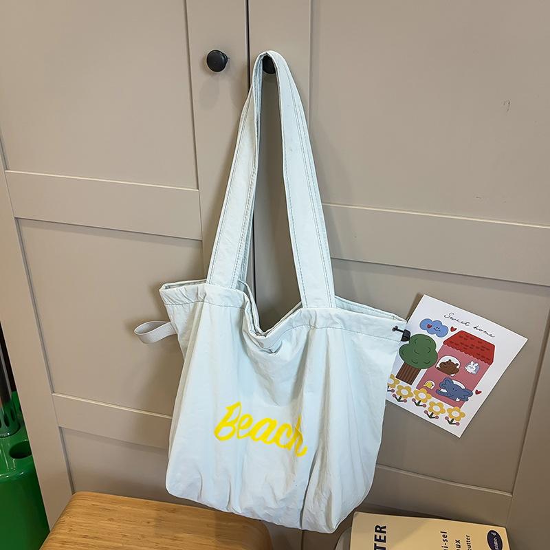 Tasche Damen Alphabet Bedruckte Nylon Schultertasche Lässig Vielseitig Tragbar Kordelzug Große Kapazität Tragetasche