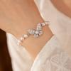 Elegant Butterfly Bracelet With Zirconia Accents Imitation Pearl Beads Pink Tone Womens Fashion Jewelry Office