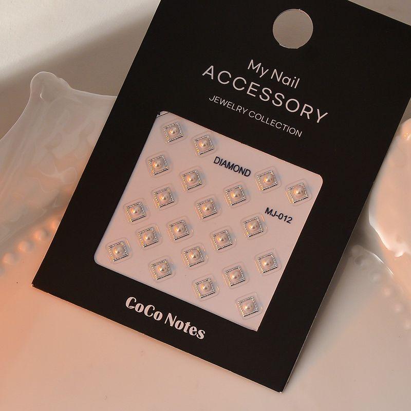 

MJ Series High-Quality Imitation Pearl Nail Stickers Pure Color Sweet Beauty Hand White Nail Jewelry In Stock 012 Silver Default