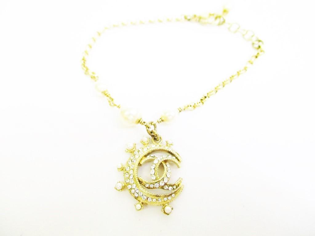 

Автентичний браслет CHANEL зі стразами CC з мотивом півмісяця №7024 відремонтований