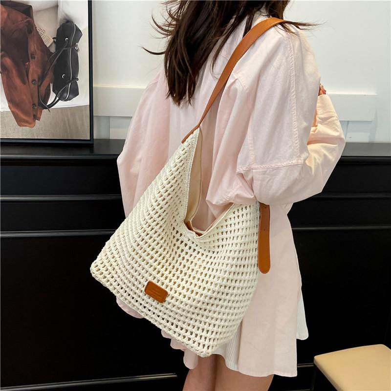 Summer large-capacity underarm bag women's 2025 new hollow woven bag simple shoulder crossbody bucket bag