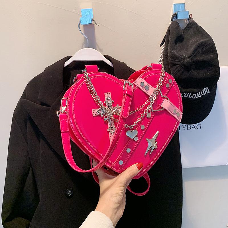 

Bags personalized creative bag women s 2025 new Korean version fashion rivet trend single shoulder hand carry love armpit bag чорний