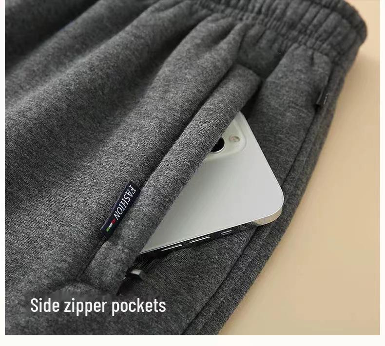 Męskie pluszowe spodnie dresowe z jagnięcej skóry - Pogrubione, o luźnym kroju, zimowe spodnie codzienne dla osób w średnim i starszym wieku.