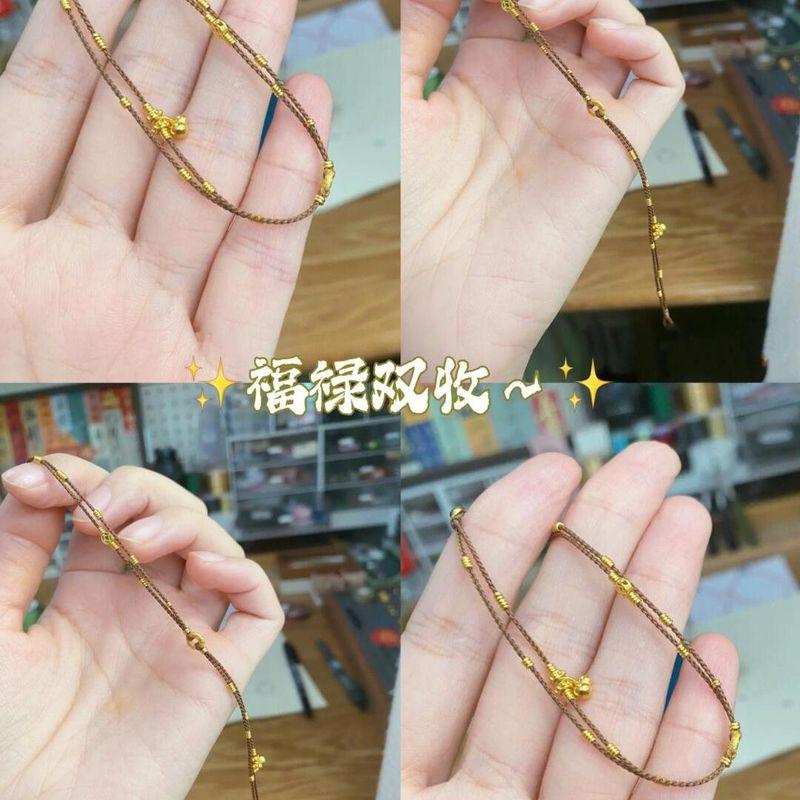 

Неограниченные деньги Счастливый маленький Дуобао с покрытием из 18-каратного золота Ремешок для переноски Новый китайский стиль Молочный кофе Ручная работа Маленькая толпа Белый Fulu Double Collection Ruyi Hand Rope-About 17cm