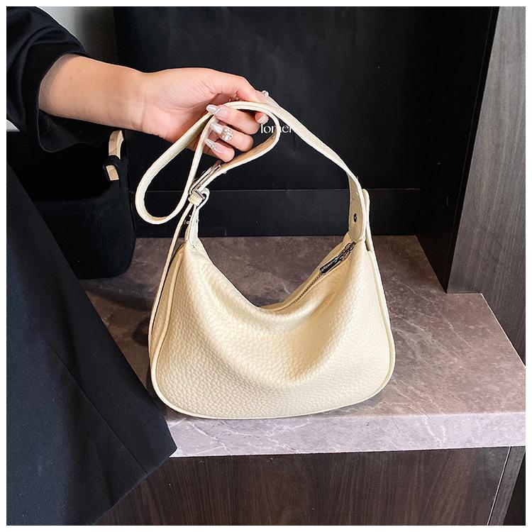 Simple and fashionable bag women's 2025 new Korean version versatile shoulder underarm bag niche high-end dumpling bag messenger bag