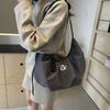 Large capacity canvas bag women's autumn and winter fashion niche design shoulder messenger bag commuter dumpling bag