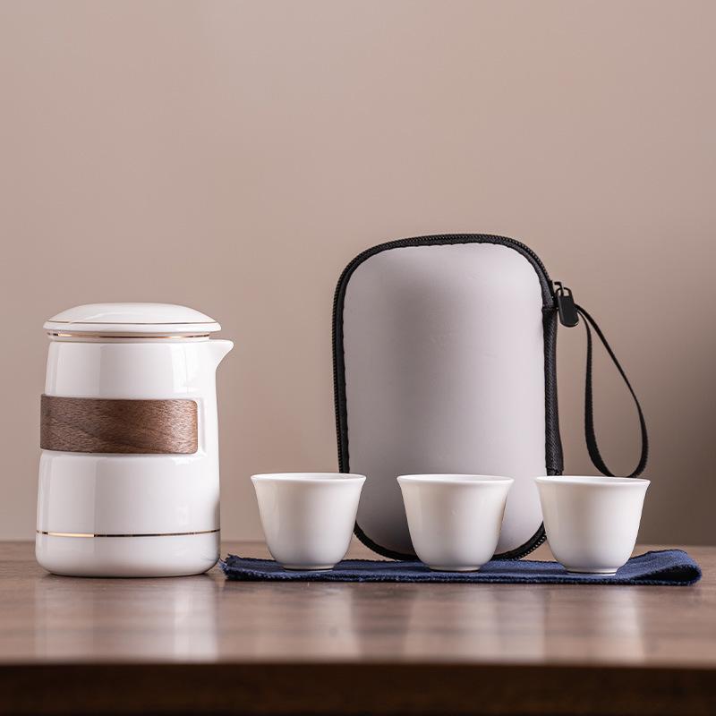 

Suet jade white porcelain travel tea set portable storage bag high-end one pot three cups corporate business gifts