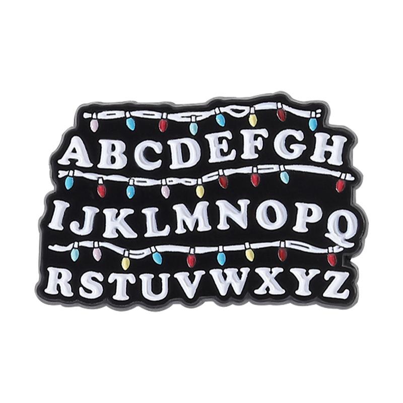 

Fantasy Horror Movies Brooch Enamel Pins Red Piranha Plant Alphabets Brooches Lapel Badge Jewelry Gift For Fans Friends as the picture