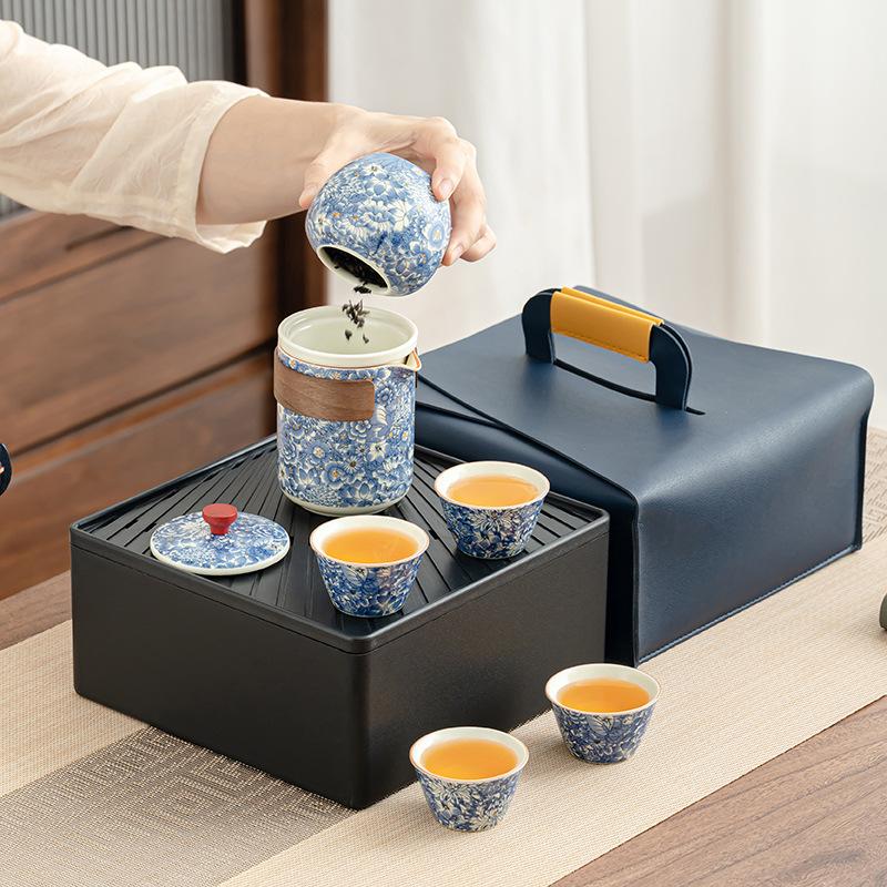 

Outdoor tea drinking travel tea set Flowering Ru kiln teapot Portable set Business gifts High-end storage bag
