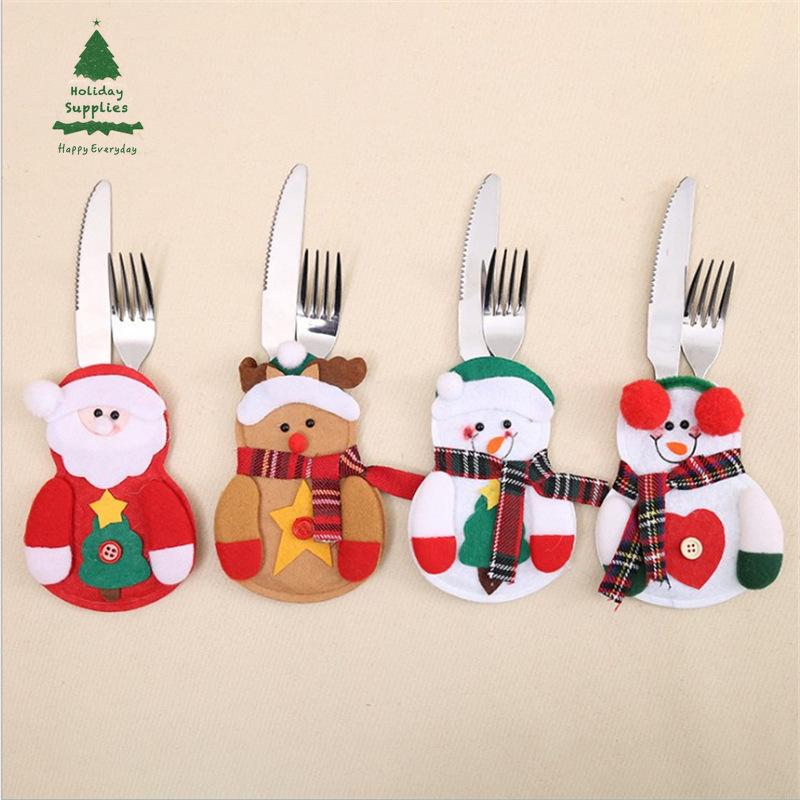 

Christmas decorations restaurant hotel layout new non-woven old snowman knife and fork bag creative tableware sets.