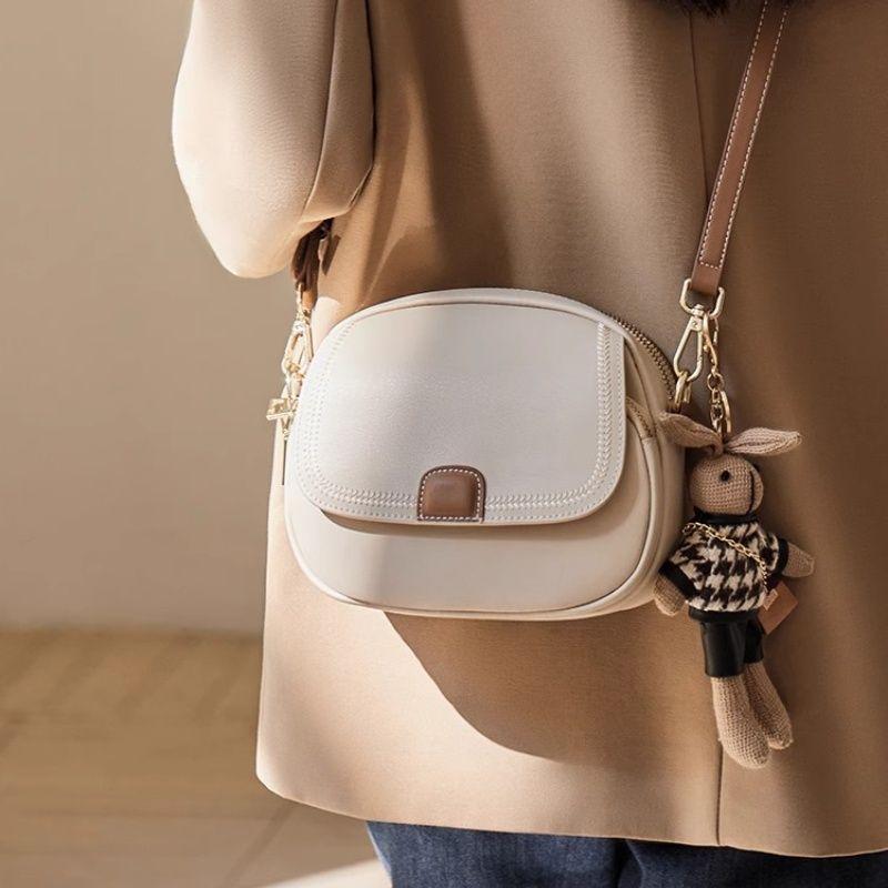 

This Year s Popular Bag Women 2025 New Shoulder Women s Bag High-Grade Shoulder Small Bag Casual All-Match Small round Bag Rice white and brown