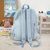 Star Print Backpack with Front Pocket and Side Drawstring Pockets for School and Casual Use