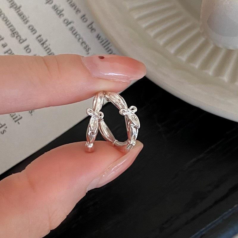 Sweet Bow Stud Earrings: Fashionable Half-Circle Design, Elegant and Versatile for Women. ed2503