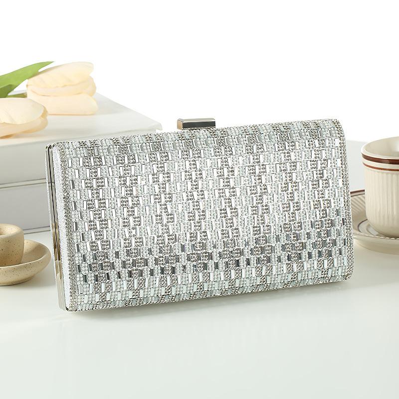 

Mainly promote the new fashionable and simple evening wear temperament lock dinner heavy industry women s messenger bag 25*5*12.5 білий