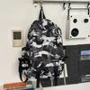 Schoolbag1011 New Large Capacity Graffiti Trendy Cool Leisure Travel Backpack Lightweight Computer Bag Middle and High School Student Backpack