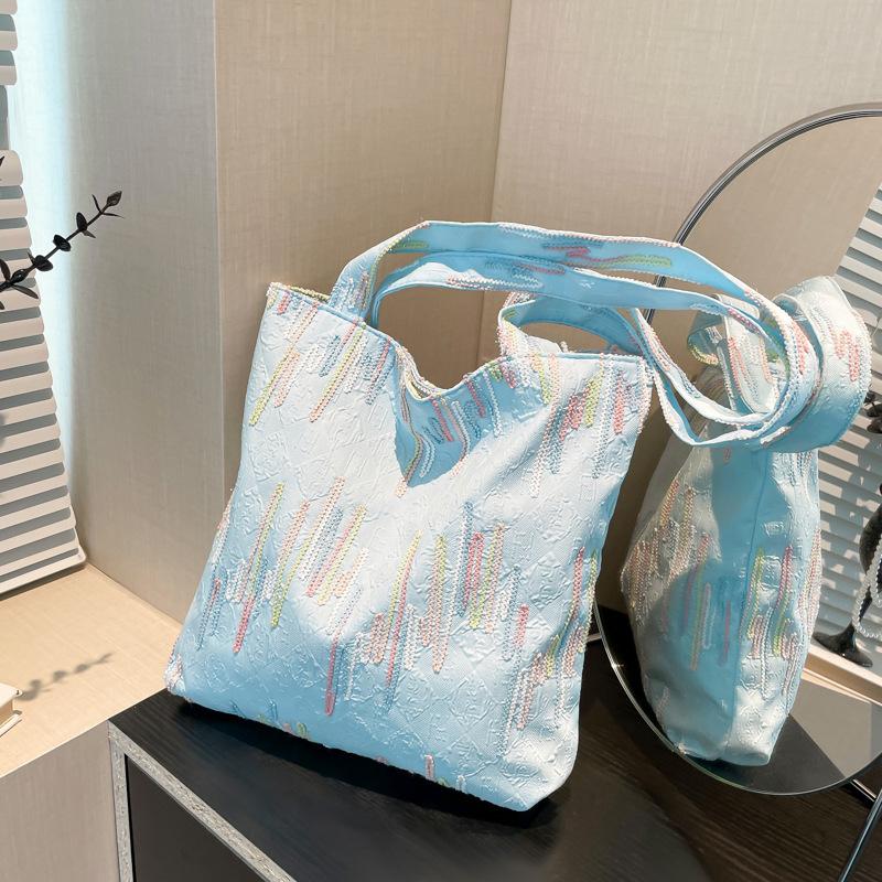 Personalized fashion casual trend armpit bag 2025 new foreign style commuting large capacity shoulder portable tote bag