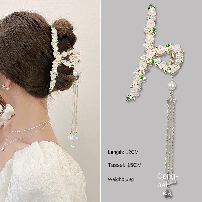 

Жемчужная ручка с кисточкой и цветком