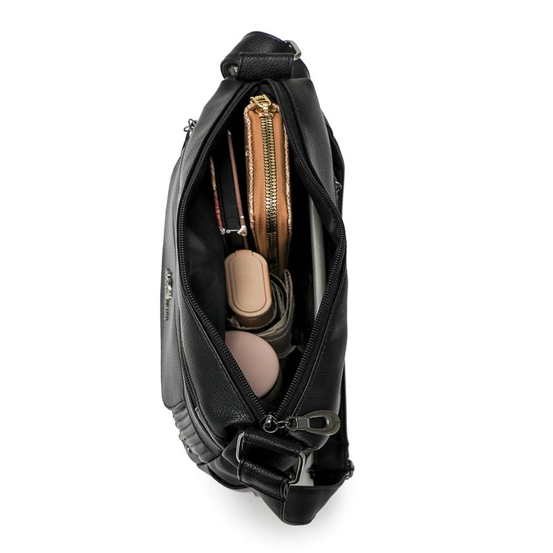 Einfarbige Damen Crossbody-Tasche mit geripptem Panel und Nieten-Details Elegante Kunstleder-Umhängetasche für den täglichen Gebrauch