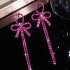 Fashion long fringed bow earrings