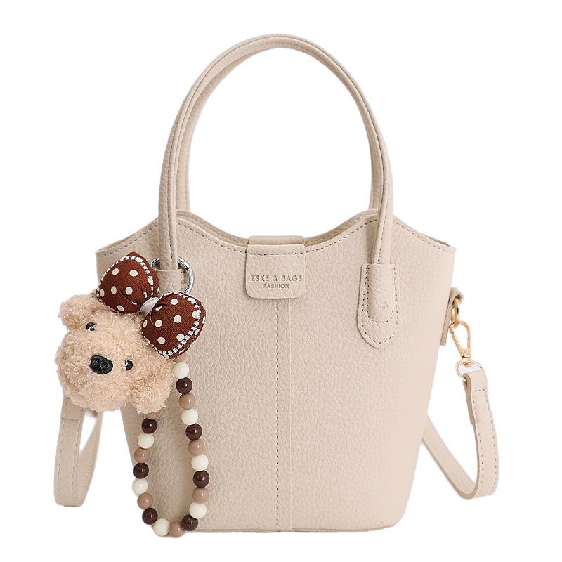 

Simple casual portable bucket bag women s spring new fashion trend niche texture shoulder messenger bag No pendant model белый