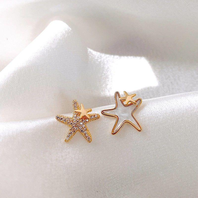 

XINGX Women s Unique to Make round Face Thin-Looked Ear Studs Asymmetric star 925 silver needle
