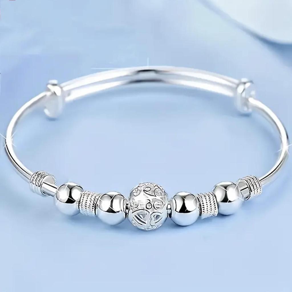 European-Style Silver-Plated Rotating Bead Bracelet for Women: Hollow Exquisite Ball Ornament Jewelry