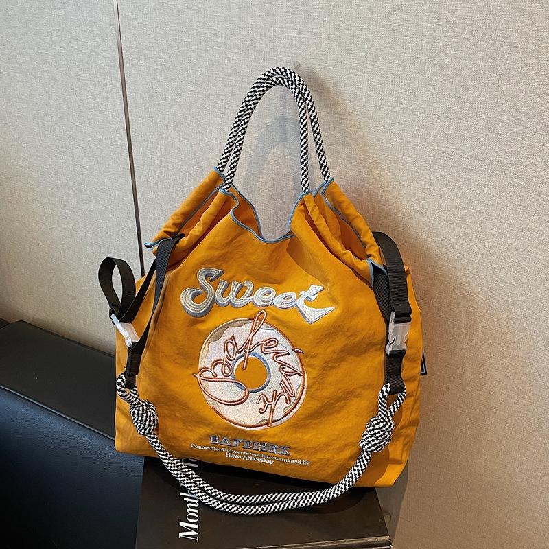 

Сумка большой вместимости женская новая модная универсальная повседневная на плечо сумка для покупок студенческая сумка-тоут для занятий женская жёлтый