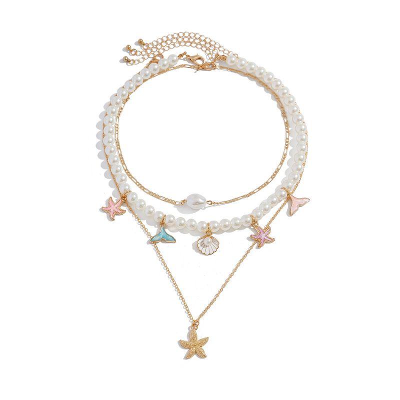 

3-Piece Set of Starfish and Scallop Imitation Pearl Necklace Set, European and American Fashion, Cute, Popular Online, Travel Photo Accessories Gold