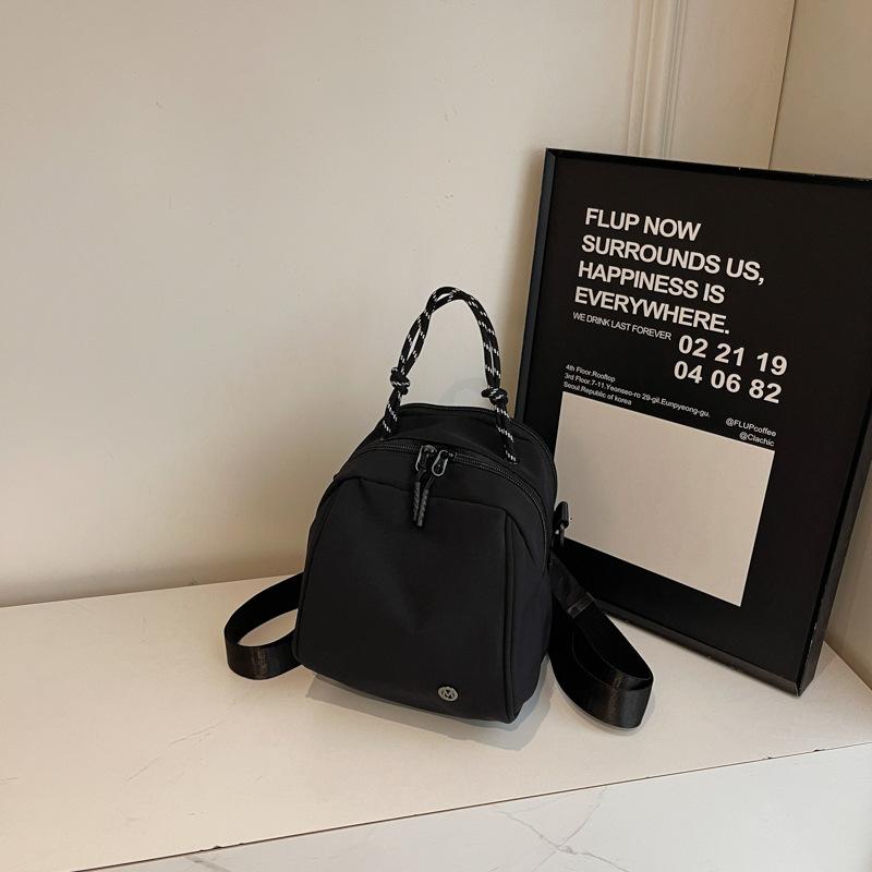 Fashion sense small backpack women's lightweight casual shoulder bag new fashion commuter shell bag simple commuter messenger bag