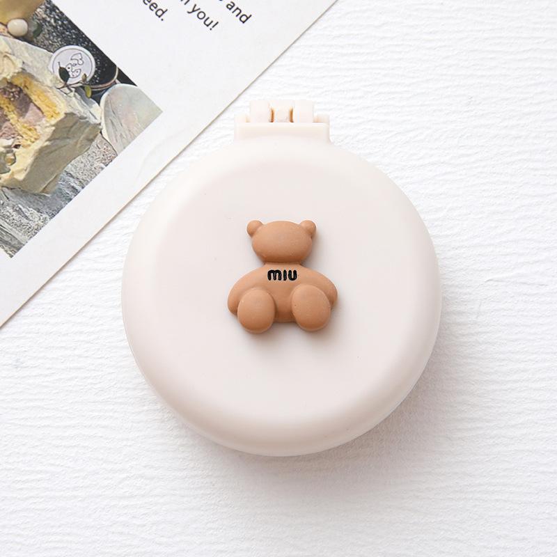 Süßer Cartoon faltbarer Airbag-Kamm tragbarer Mini-Kissen-Haarkamm mit Spiegel für Frauen integrierter Massagekamm leichtgewichtig