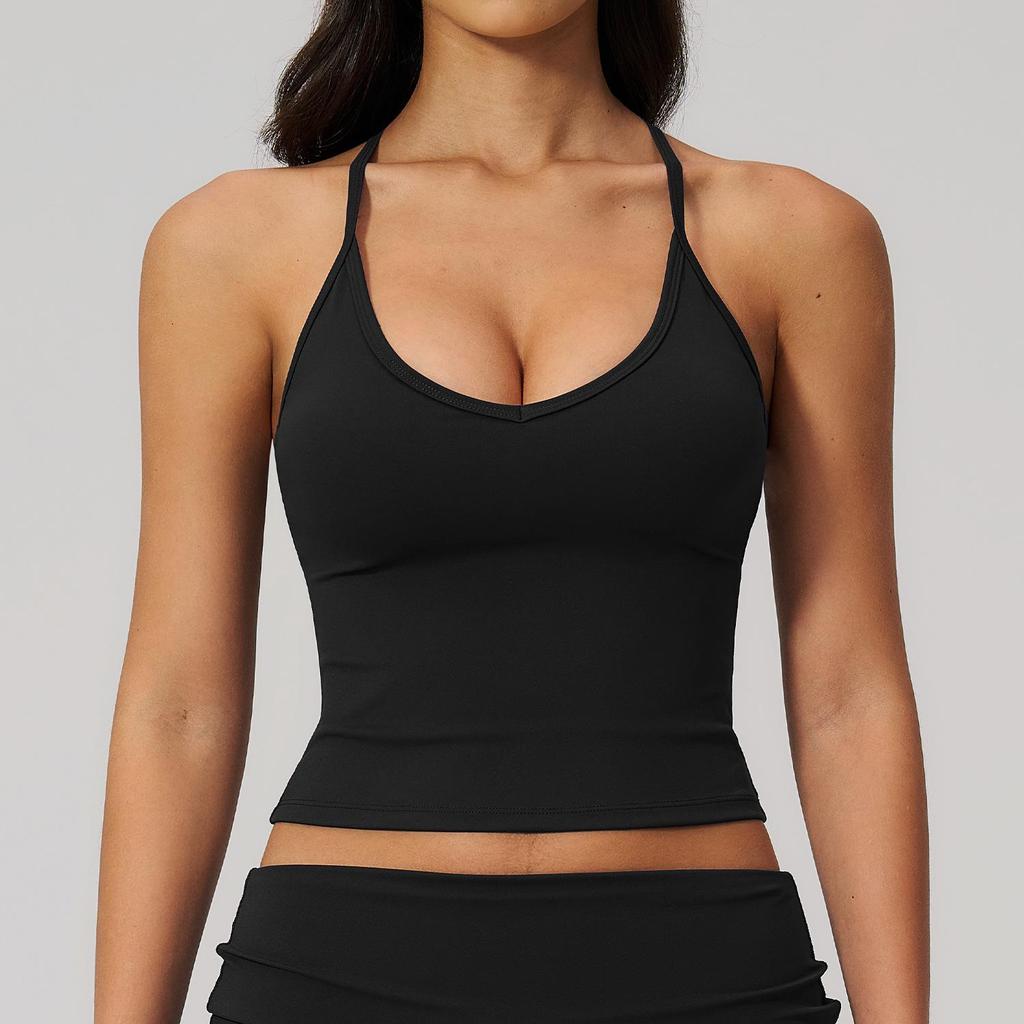 Introducing the Stylish Women's Quick-Dry Yoga Tank Top: Beautiful Design, Perfect for Fitness & Sports.