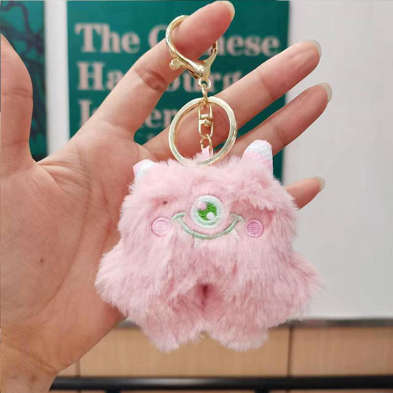 Delightful Mini Plush Monster Keychain Features Short Plush Material Available In Multiple Colors