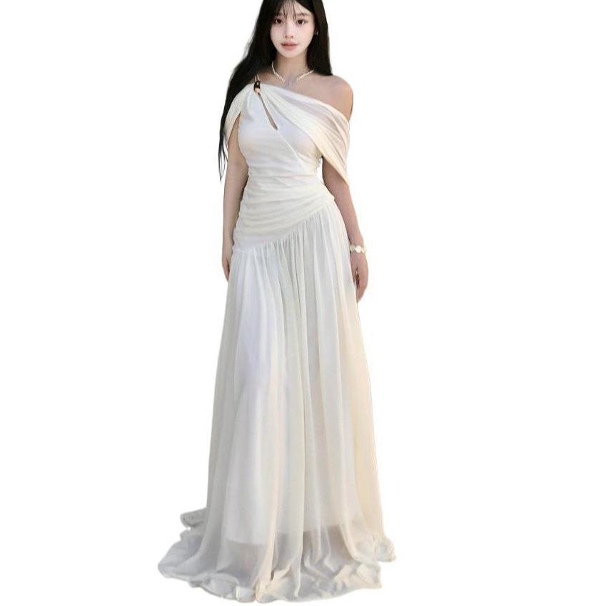 French white off-the-shoulder hollow pleated dress, high-end female summer pure desire wind vacation beach fairy long dress