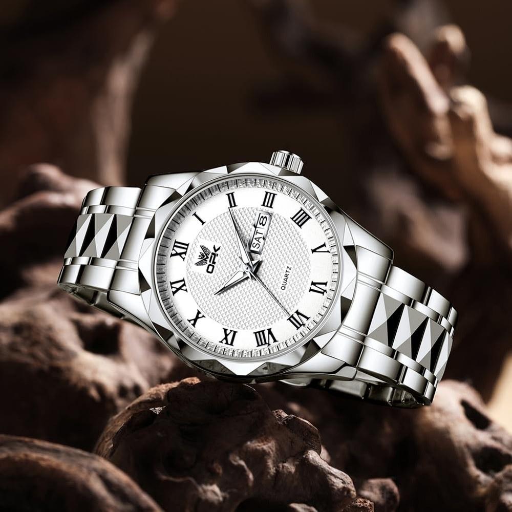 Generic Women's Quartz Watch Round Face 28mm Stainless Steel Calendar Day Date Roman Numeral Water Resistant Silver