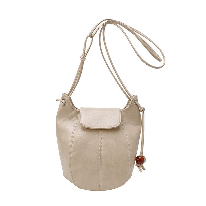 

Wholesale new oil wax leather niche simple solid color mobile phone bag casual versatile commuting foreign style messenger bag women хаки