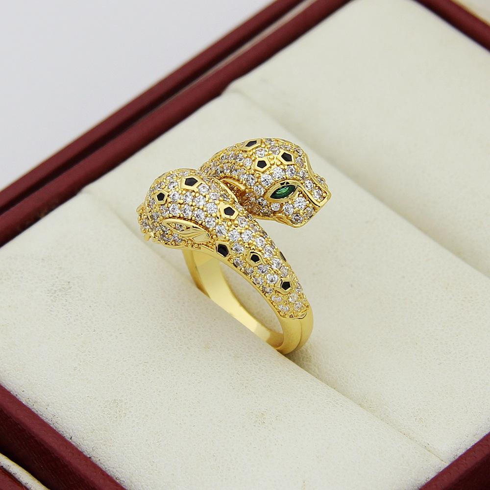 Ach, zlaté šperky, zelené diamantové oči plné diamantů, otevřený prsten s dvěma leopardy, prsten s hlavami dvou leopardů plný diamantů, leopard.