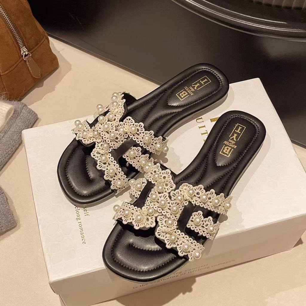 Seaside pearl drag girl summer 2025 outer wear Xiaoxiang flat bottom one-word drag fairy niche is beautiful and cool