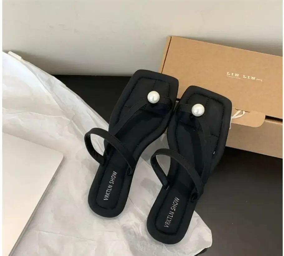 

Модные праздничные пляжные тапочки, женские летние минималистичные сандалии 2024 г., корейские французские женские повседневные шлепанцы на плоской подошве, повседневная одежда Lide 40 чёрный