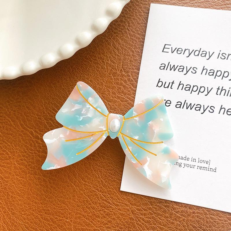 

Floral Fashionable Print Hair Clip Featuring Graceful Bow Design Ideal For Daily Use StyleI