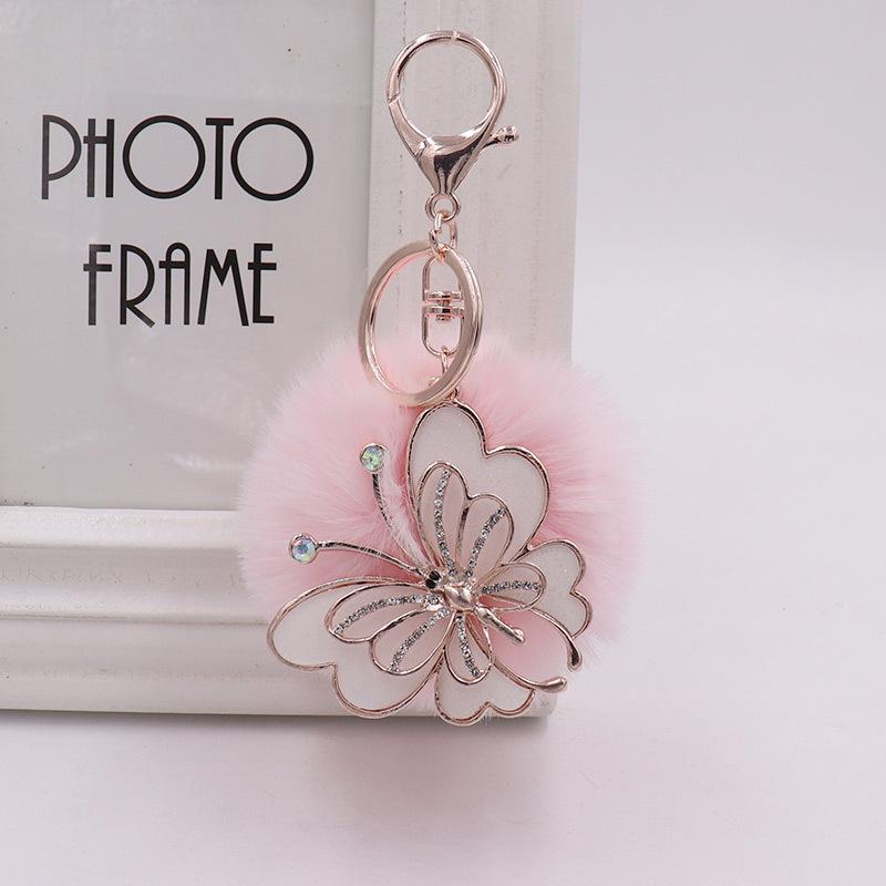 Exquisite Butterfly Plush Fur Ball Keychain for Bags, Cars, and Luggage.