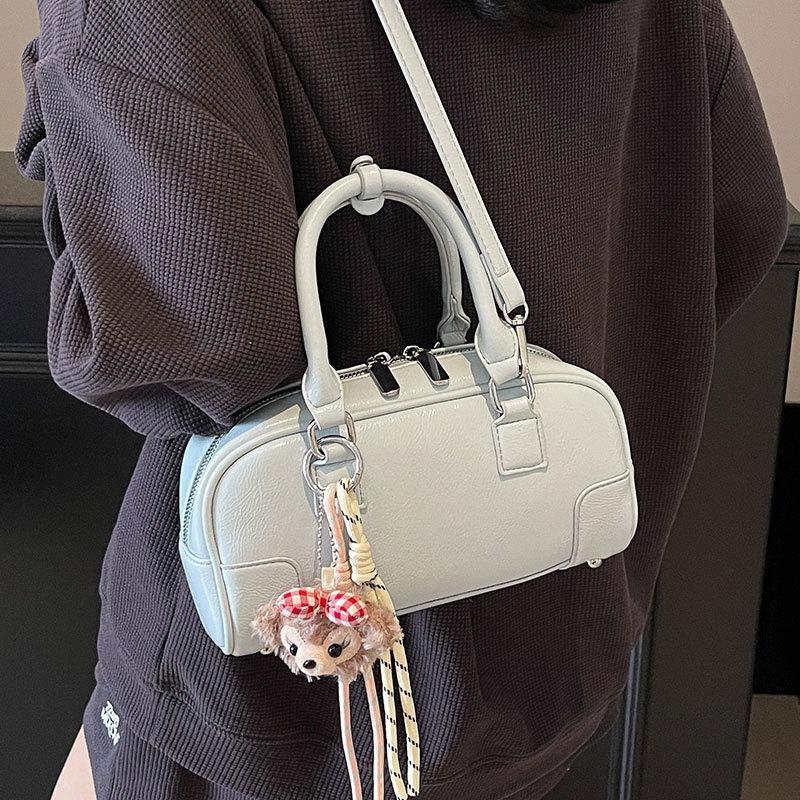 2025 Spring New Korean Version Simple Portable Bowling Bag Women's Versatile Foreign Style Commuter Premium Sense Messenger Bag