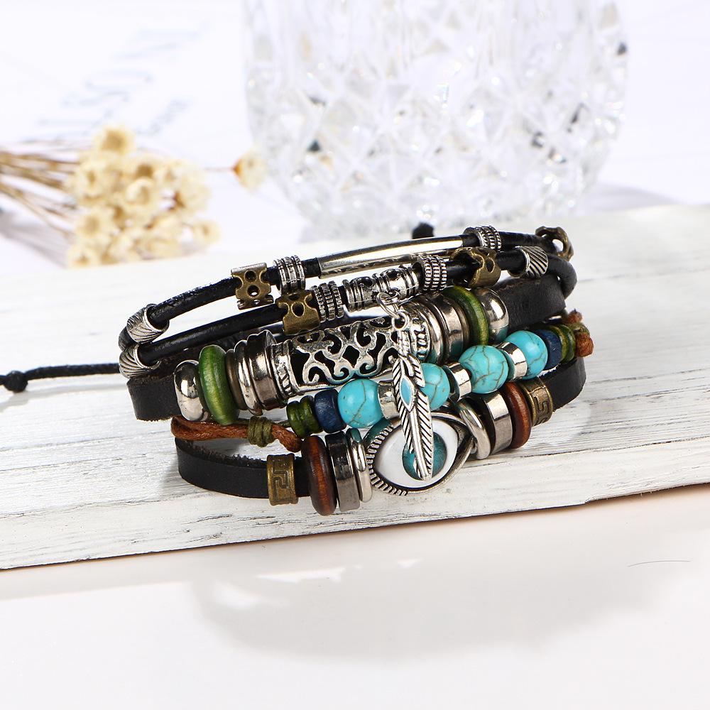 Ethnic Alloy Feather Pendant Cowhide Beaded Woven Bracelet